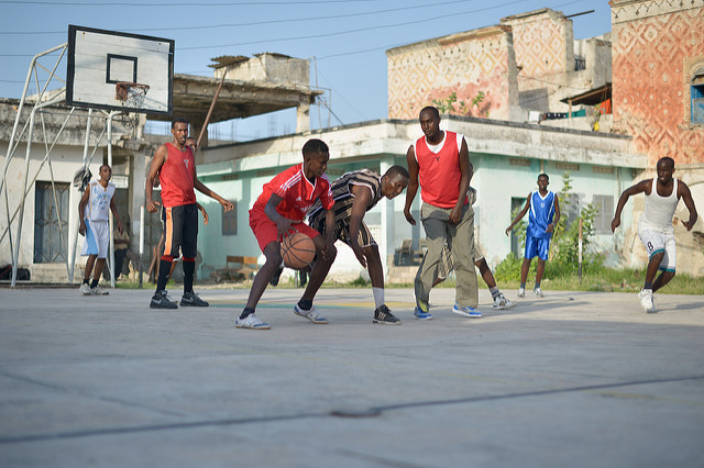 Basketball Players playing game